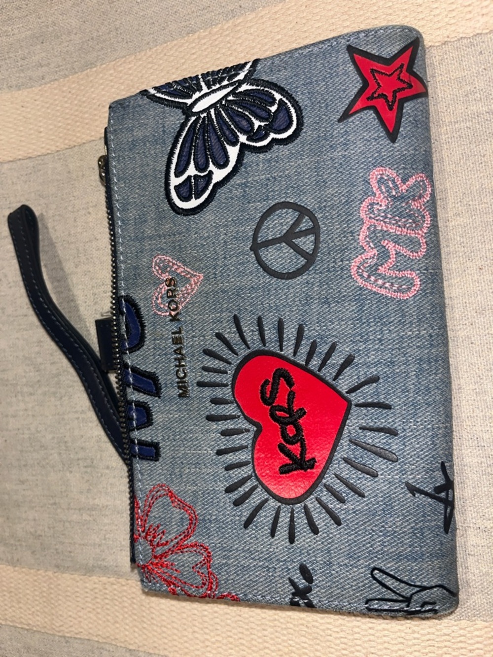 Michael Kors Denim Wristlet with Red and Pink Patch Accents